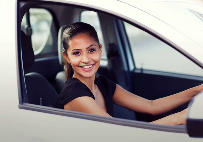 Woman buying a new car