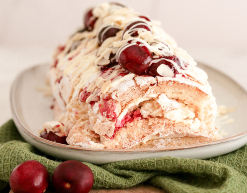 Chilled Almond Meringue Roulade filled with fresh Cherries, Mascarpone and Cream