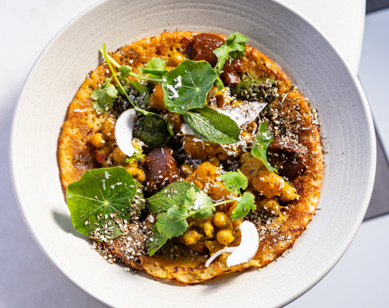 Farinata - chickpea & pumpkin curry, green pea chutney, tamarind chutney and fresh coconut